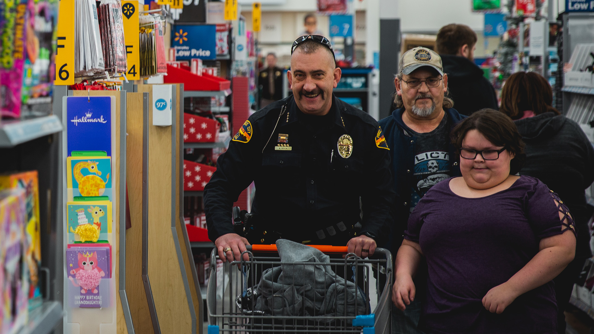 Video thumbnail showing police officers interacting with community members